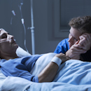 Nurse holding a patients hand Nurse holding a patients hand