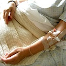 Patient with an IV in their arm Patient with an IV in their arm